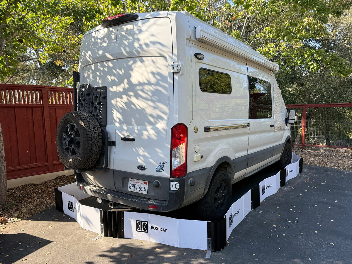 Sprinter van parked outdoors with Box-Kat mouse barrier