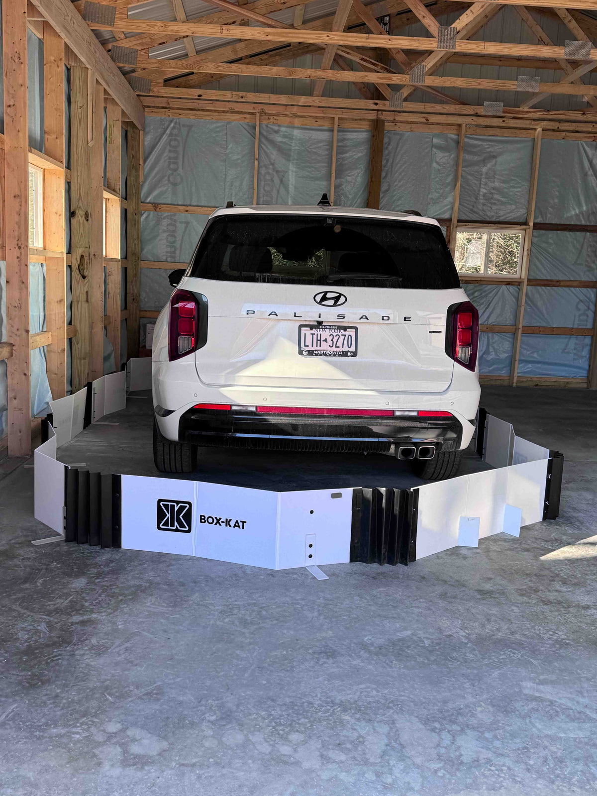 Hyundai Palisade parked in garage with Box-Kat mouse barrier